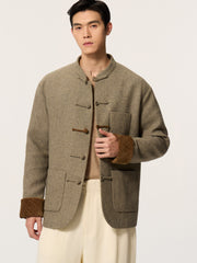 A long-sleeved, collarless coat in traditional Chinese style