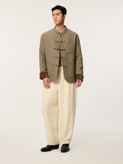 A long-sleeved, collarless coat in traditional Chinese style